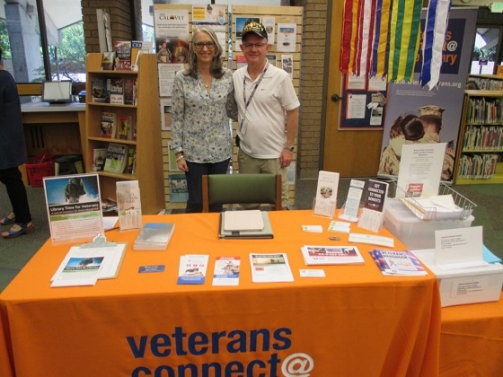 Coordinator Evelyn Figeroid and volunteer Bill Mattingly