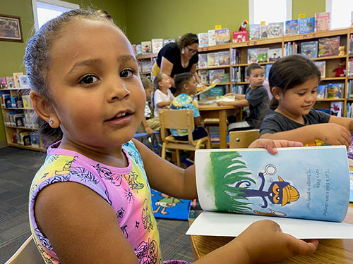 A young child in a classroom