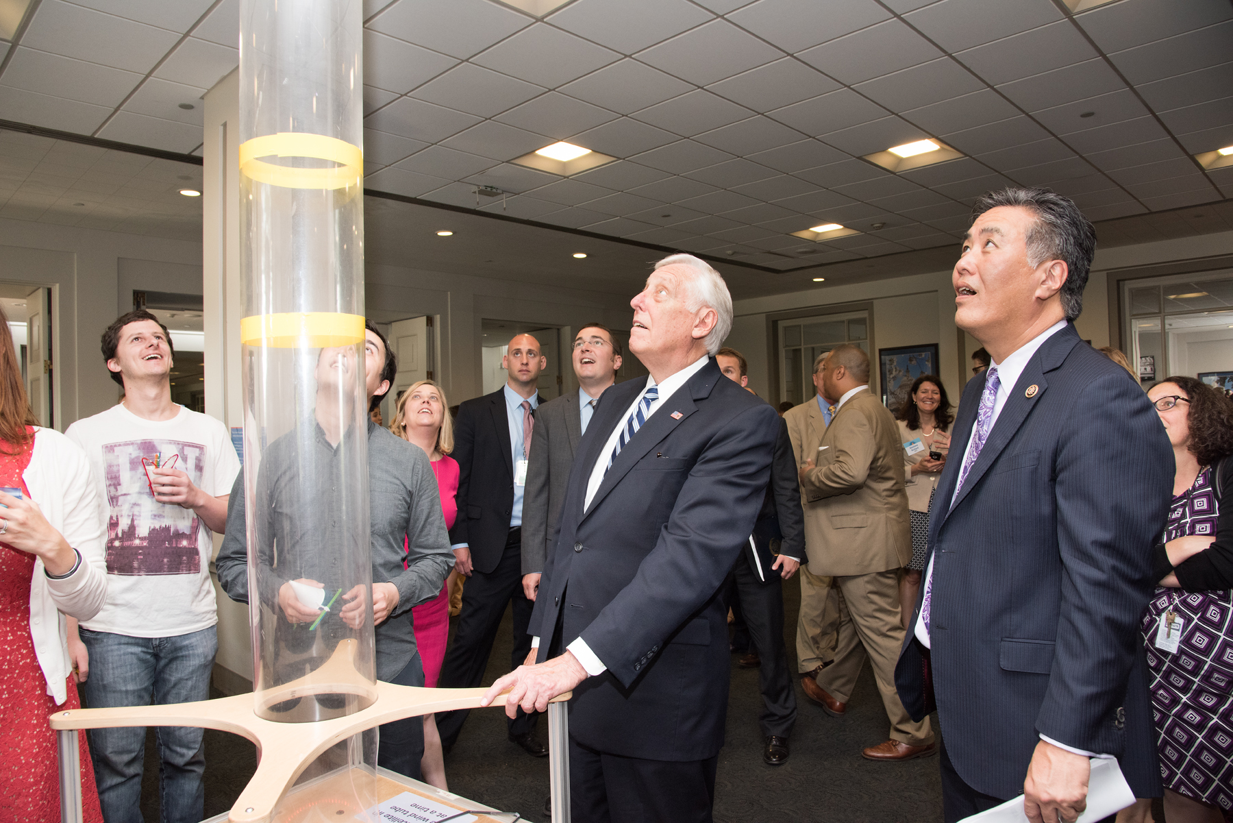 Representatives Steny Hoyer (left) and Mark Takano (right) enjoy the Museum of Science, Boston’s Faire activity.