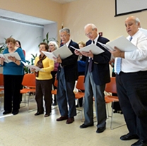 seniors rehearse lines from a play at the library