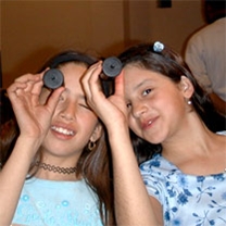 Image of students participating in various theme-based activities during a 2-hour workshop. Image courtesy of New Mexico Museum of Natural History and Science.