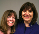 Pam Smith (R), Anythink Library Director, talks with her friend and colleague, Sharon Morris (L) of the Colorado State Library.