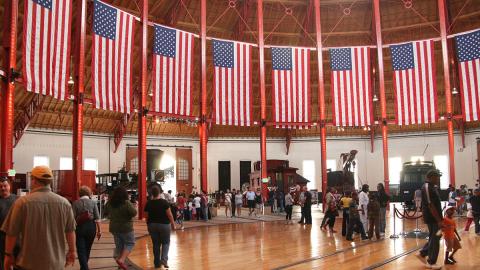 B&O Railroad Museum. The station's focal point is the roundhouse dome covering a wooden turntable surrounded by 22 stalls that contain cars and locomotives.